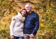 Older couple walking outside in Fall